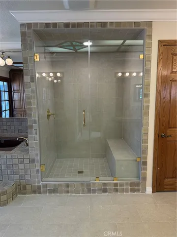 a kitchen with stainless steel appliances granite countertop a stove and a refrigerator