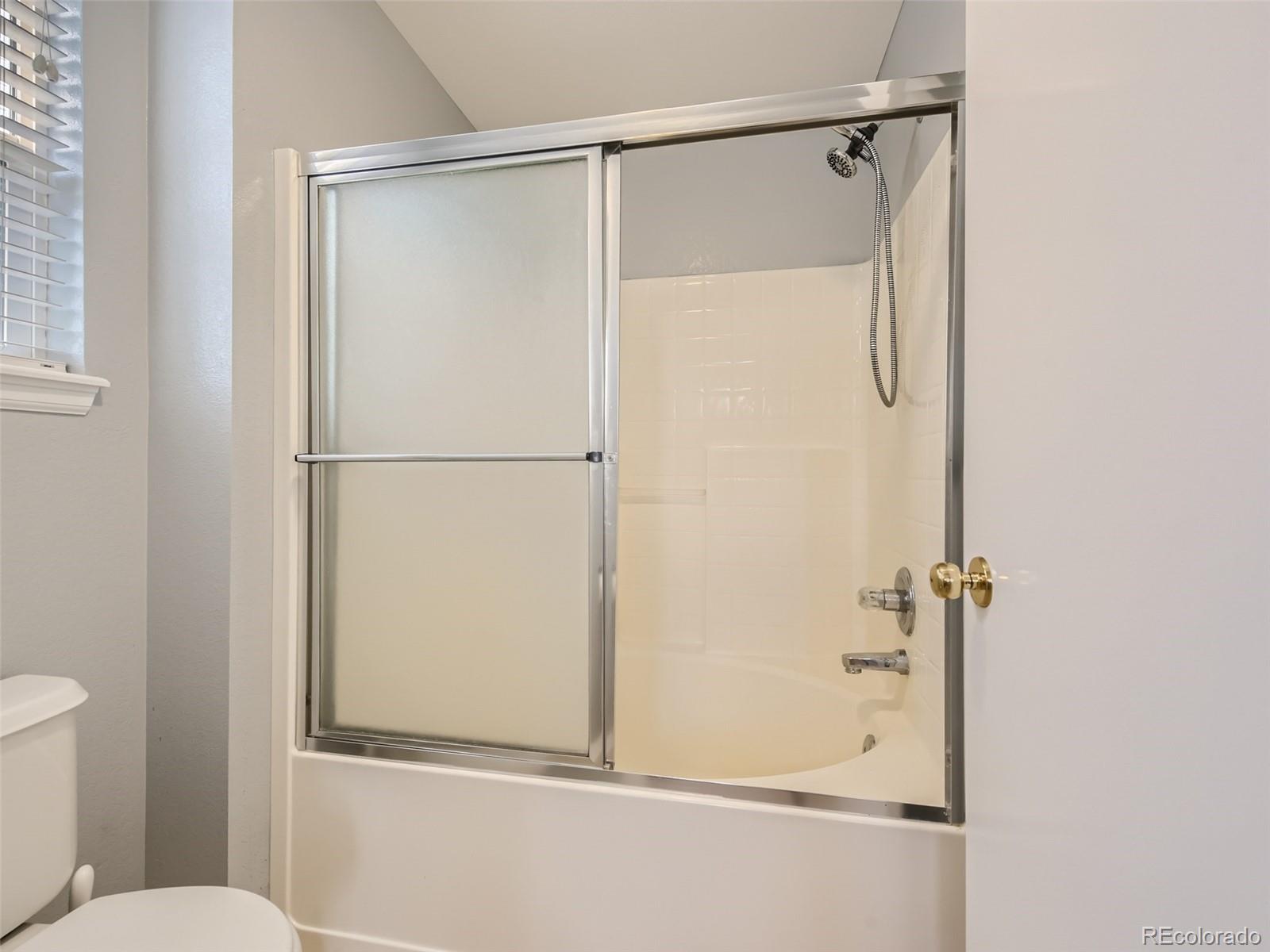 10574 Tracewood Circle Highlands Ranch, CO 80130 - Photo 11 of 21 a bathroom with a shower