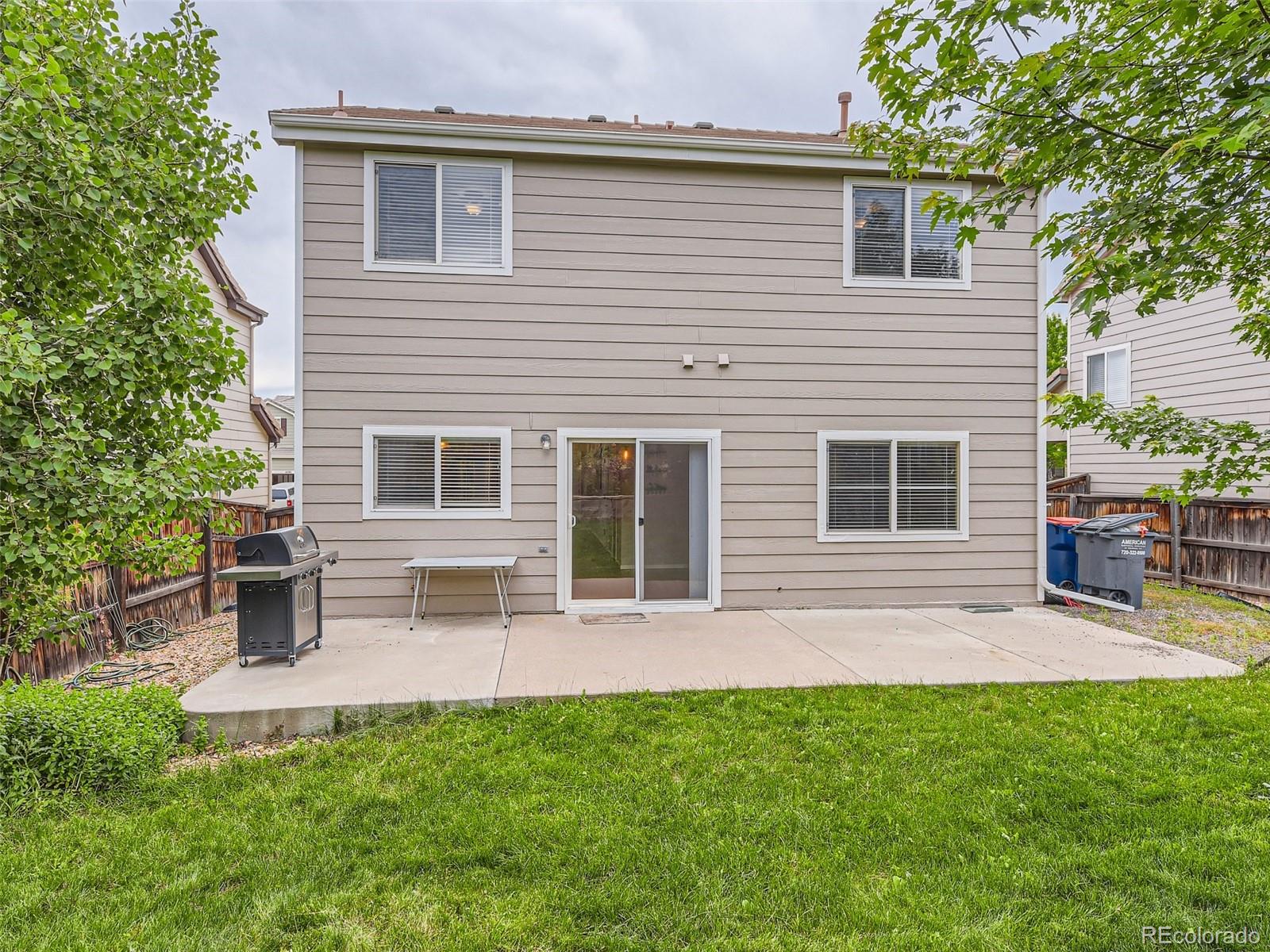 10574 Tracewood Circle Highlands Ranch, CO 80130 - Photo 21 of 21 a house view with a seating space