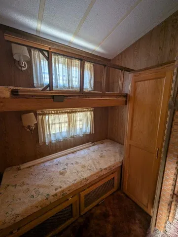 a view of room with window and hardwood