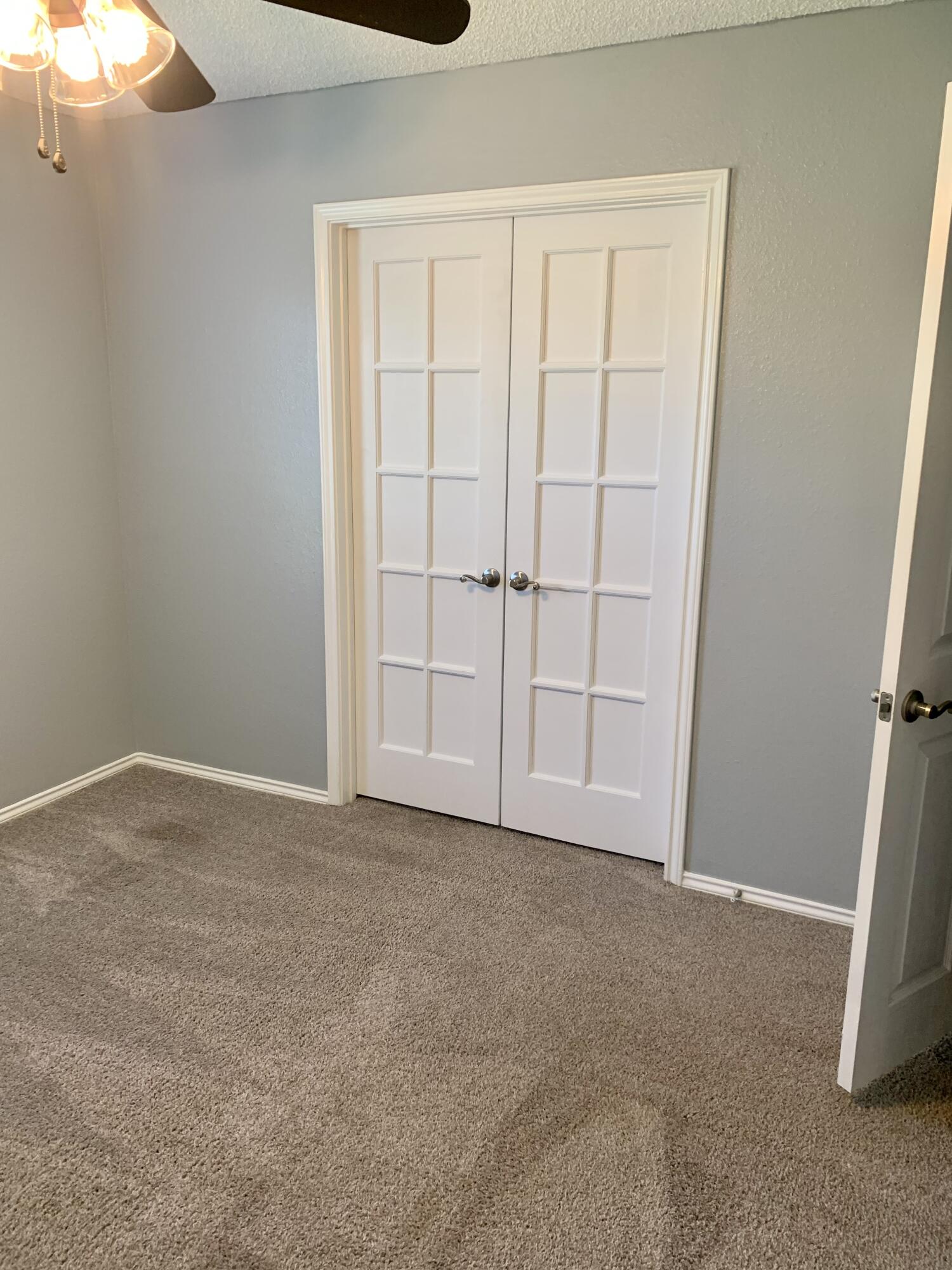 8904 Elgin Avenue Lubbock, TX 79423 - Photo 9 of 20 an empty room with a empty space