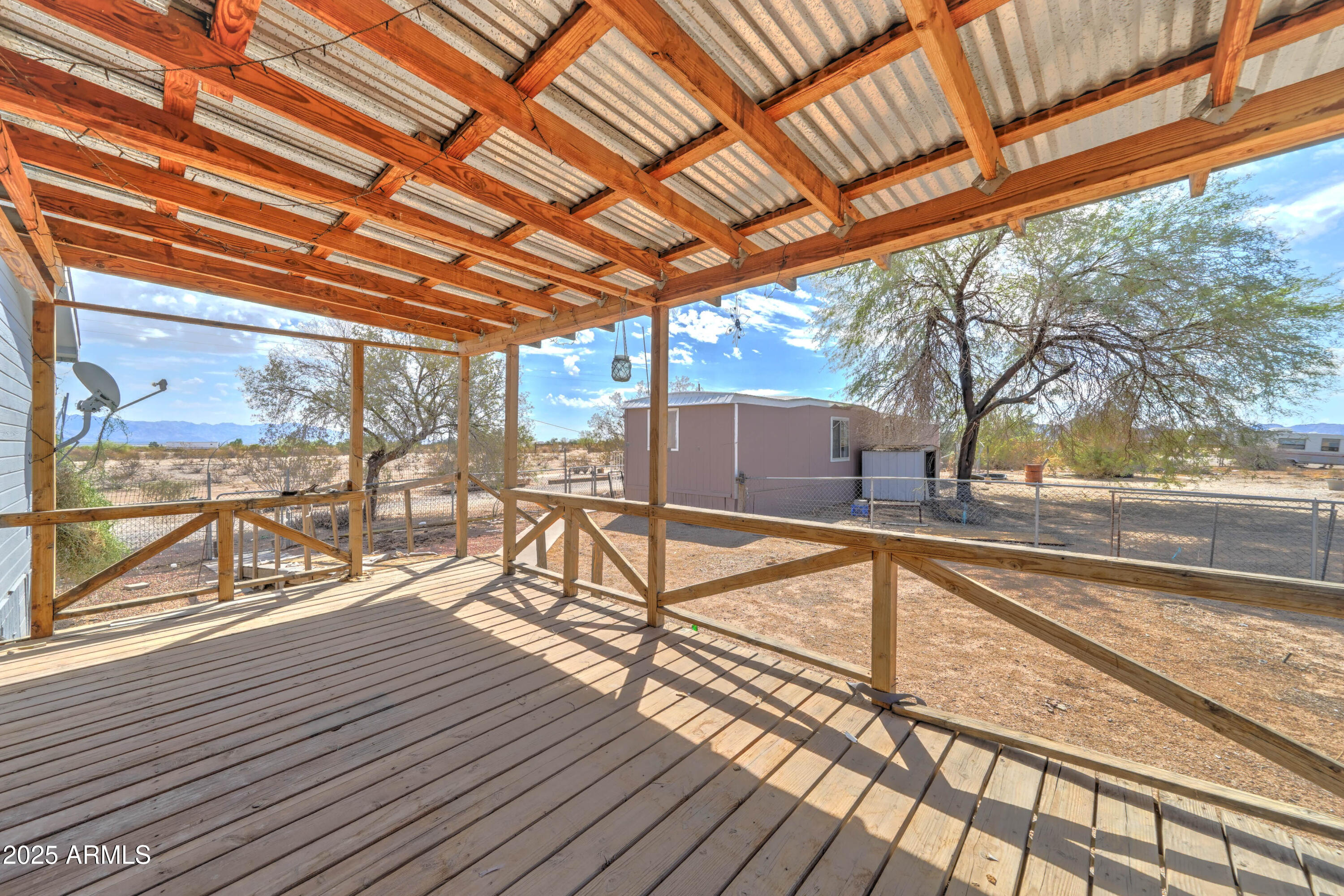 23402 South Manzanilla Road Buckeye, AZ 85326 - Photo 23 of 46 a view of a patio with wooden floor
