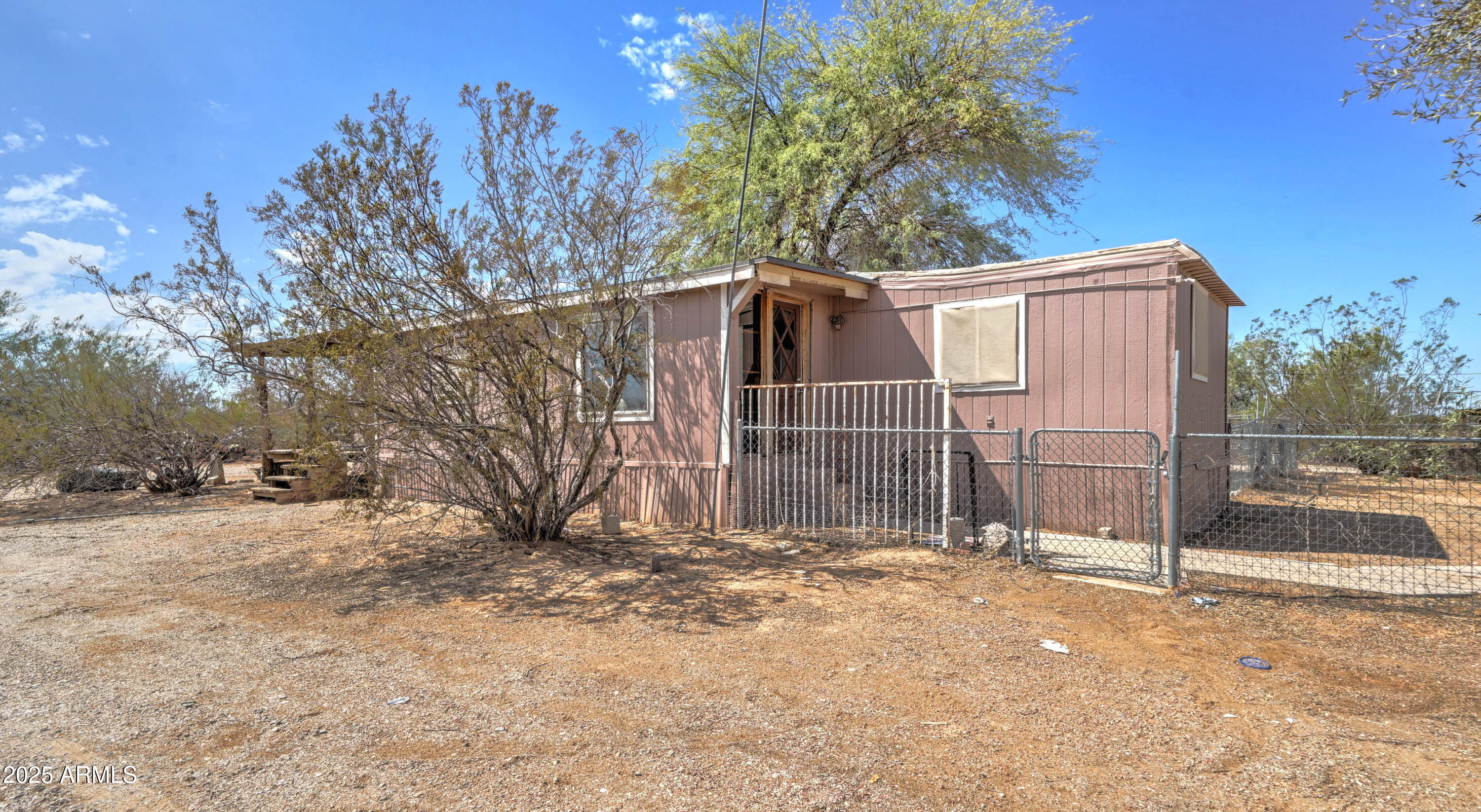 23402 South Manzanilla Road Buckeye, AZ 85326 - Photo 30 of 46 a view of backyard space
