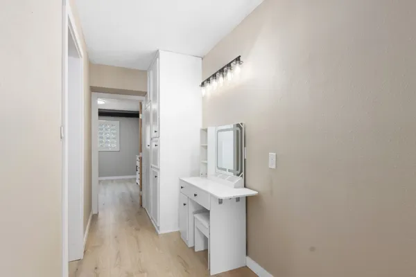 a bathroom with a double vanity sink and mirror