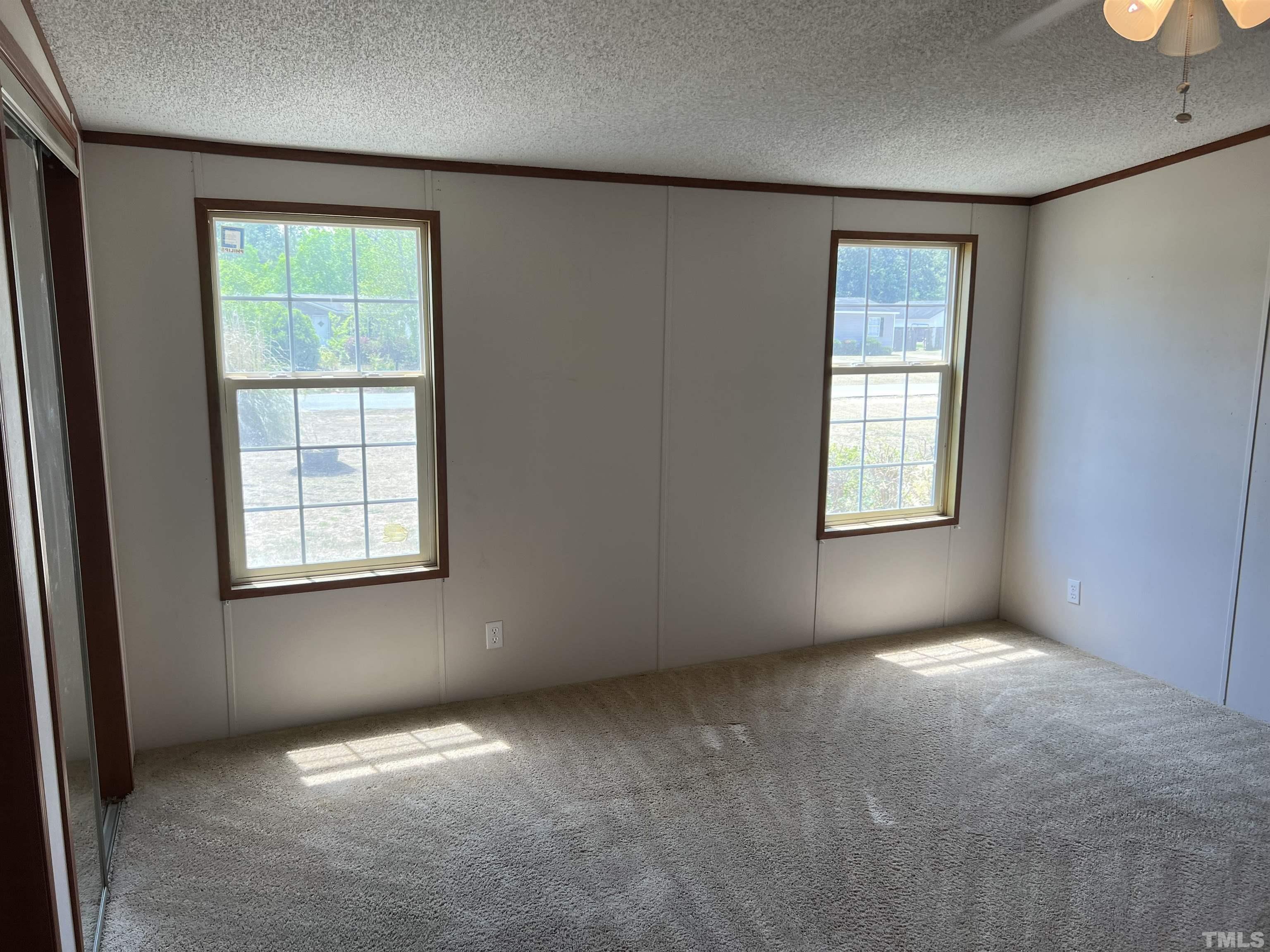 641 Rockinghorse Court Stedman, NC 28391 - Photo 23 of 50 an empty room with windows