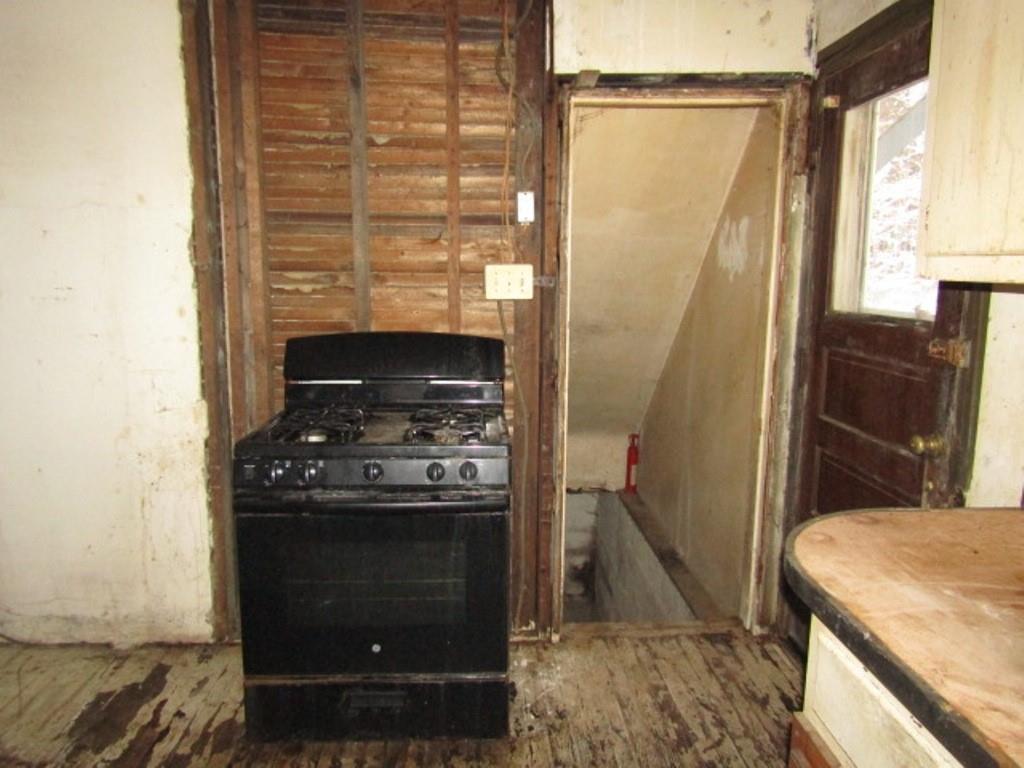 234 Spring Run Road Crescent, PA 15046 - Photo 12 of 24 a kitchen with a stove and a refrigerator
