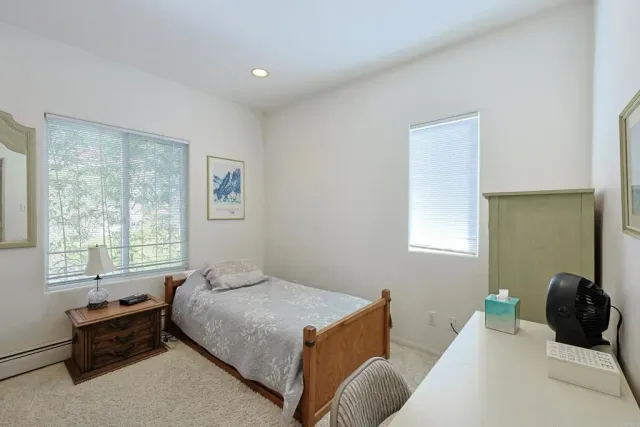 a view of a hallway with windows