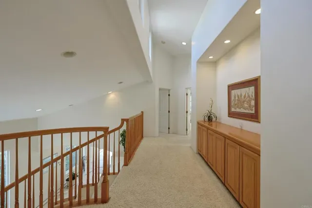 a view of a patio with table and chairs and potted plants
