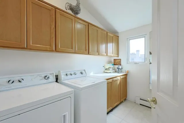 a view of a patio with a table and chairs