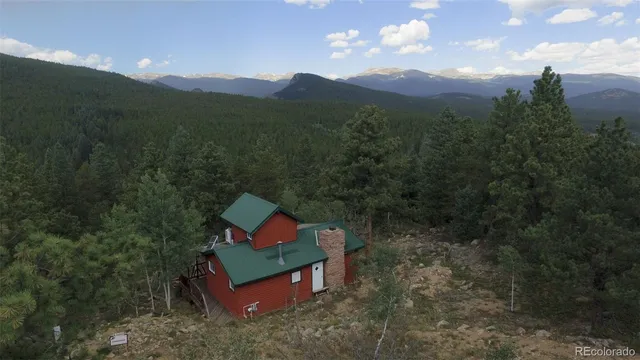 a view of a back yard with a garden