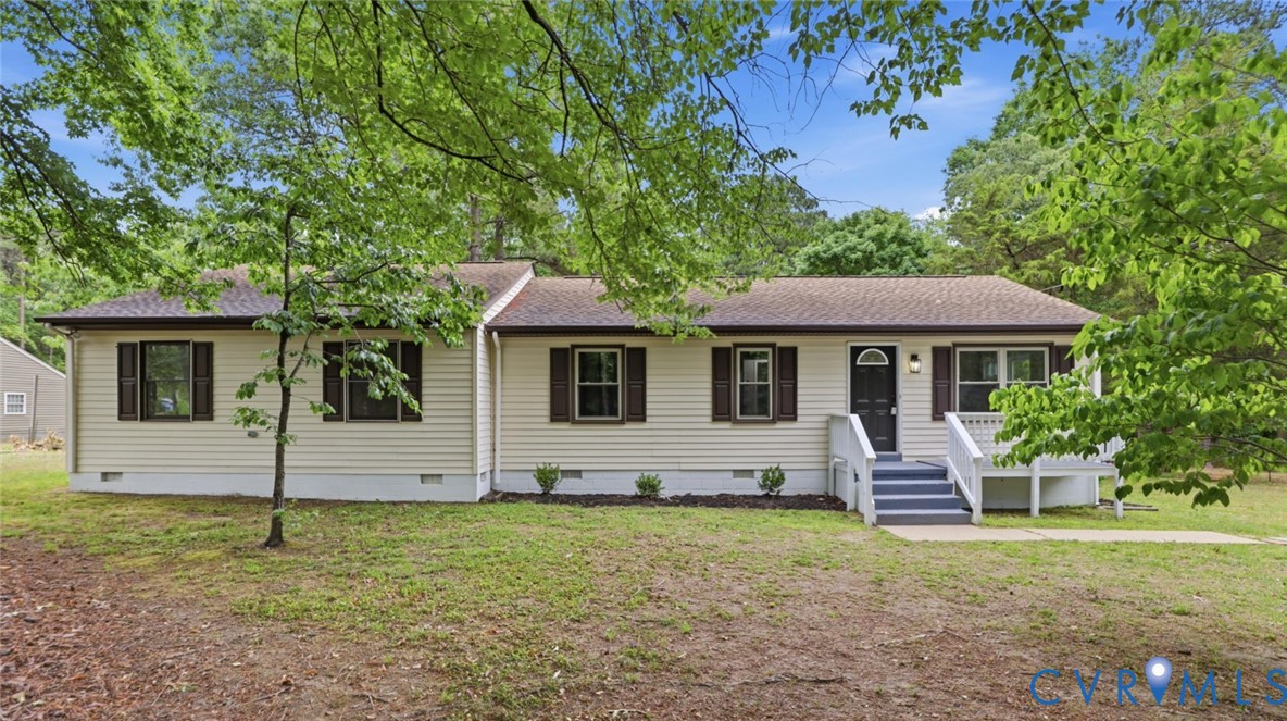 3200 Portugee Road Sandston, VA 23150 - Photo 1 of 26 a front view of a house with garden
