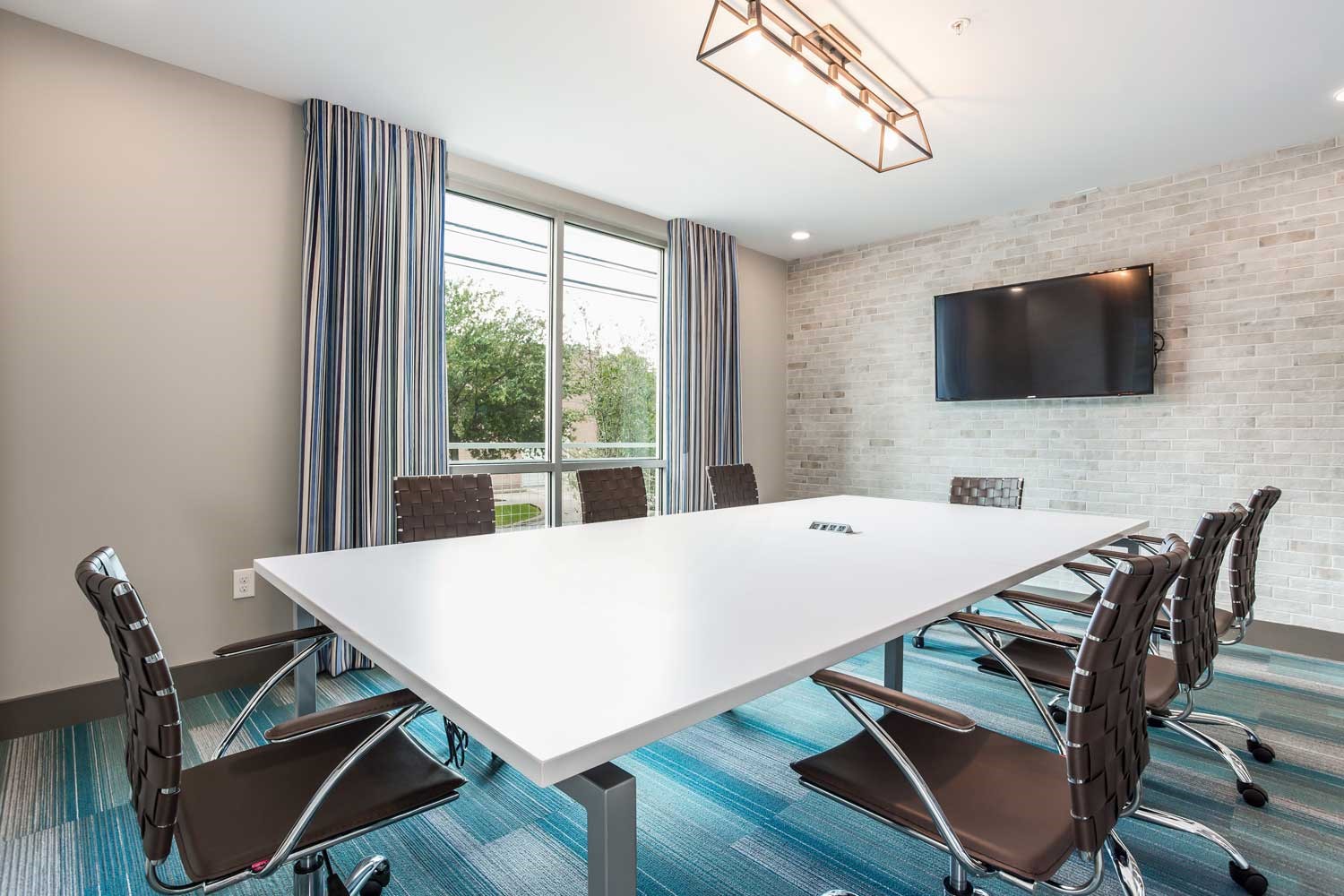 1111 Durham Drive, Unit 203 Houston, TX 77007 - Photo 13 of 15 a view of a dining room with furniture window and wooden floor