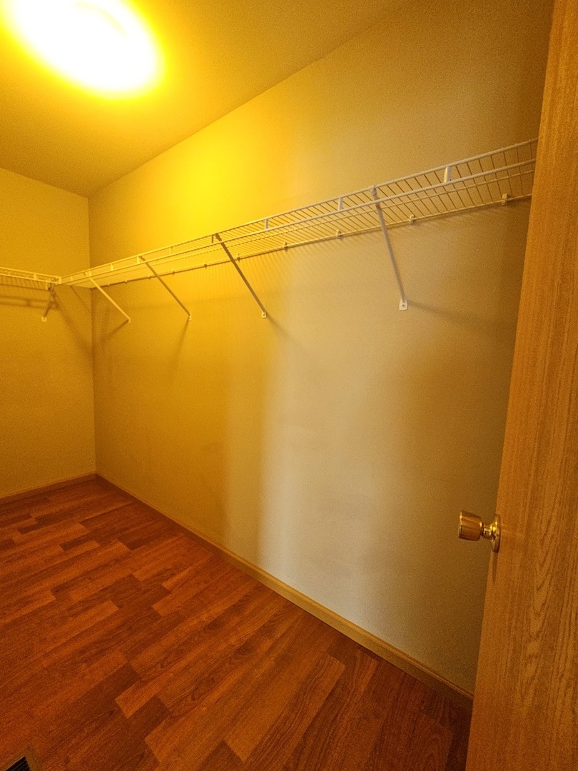1530 Glacier Trail Carpentersville, IL 60110 - Photo 12 of 24 a view of a room with wooden floor