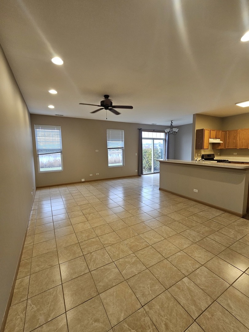 1530 Glacier Trail Carpentersville, IL 60110 - Photo 4 of 24 a view of a kitchen with a sink and cabinets