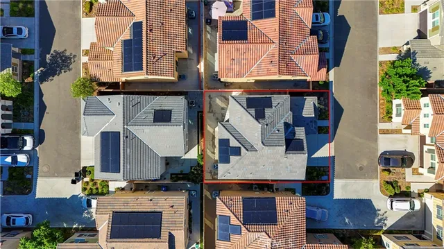 a aerial view of a house with sitting area