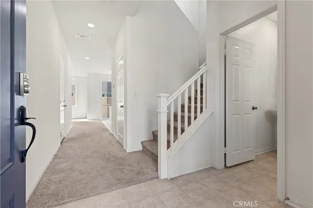 a view of a livingroom with a staircase