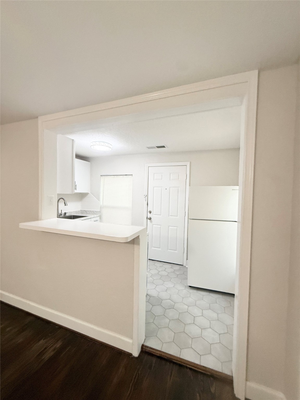 620 East Magnolia Street Angleton, TX 77515 - Photo 8 of 20 a bathroom with a sink and a mirror
