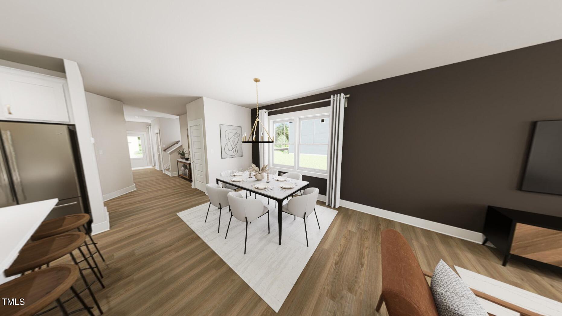 320 Beacon Drive Pittsboro, NC 27312 - Photo 10 of 22 a view of a living room with wooden floor