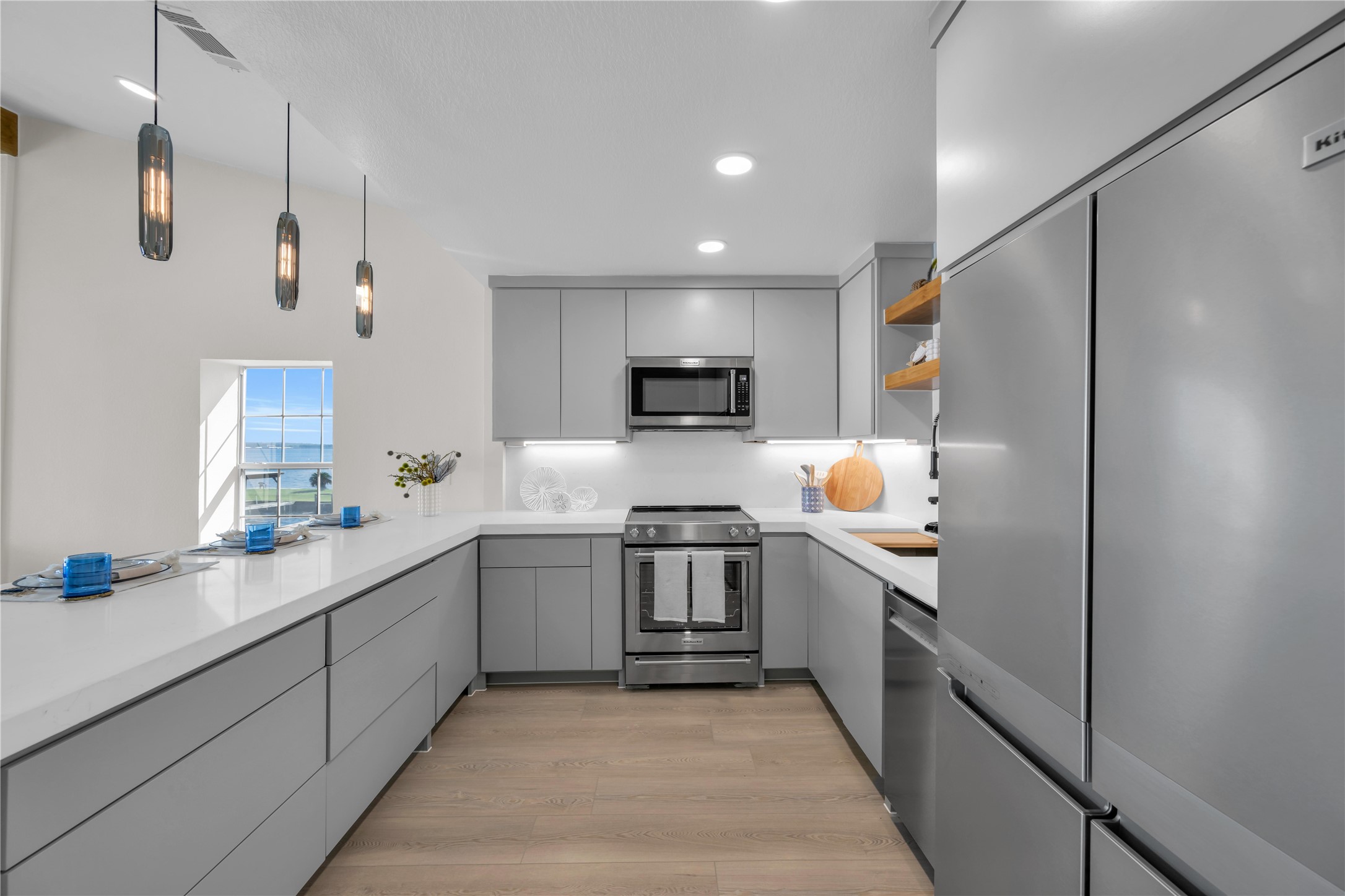 30 Regency Montgomery, TX 77356 - Photo 22 of 47 a kitchen with stainless steel appliances granite countertop a refrigerator and a sink