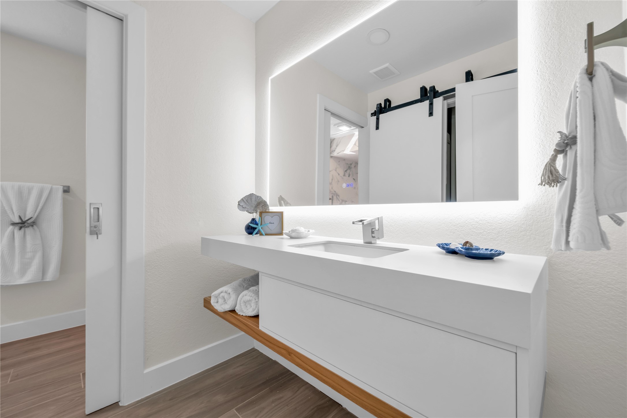 30 Regency Montgomery, TX 77356 - Photo 29 of 47 a bathroom with a sink and a mirror