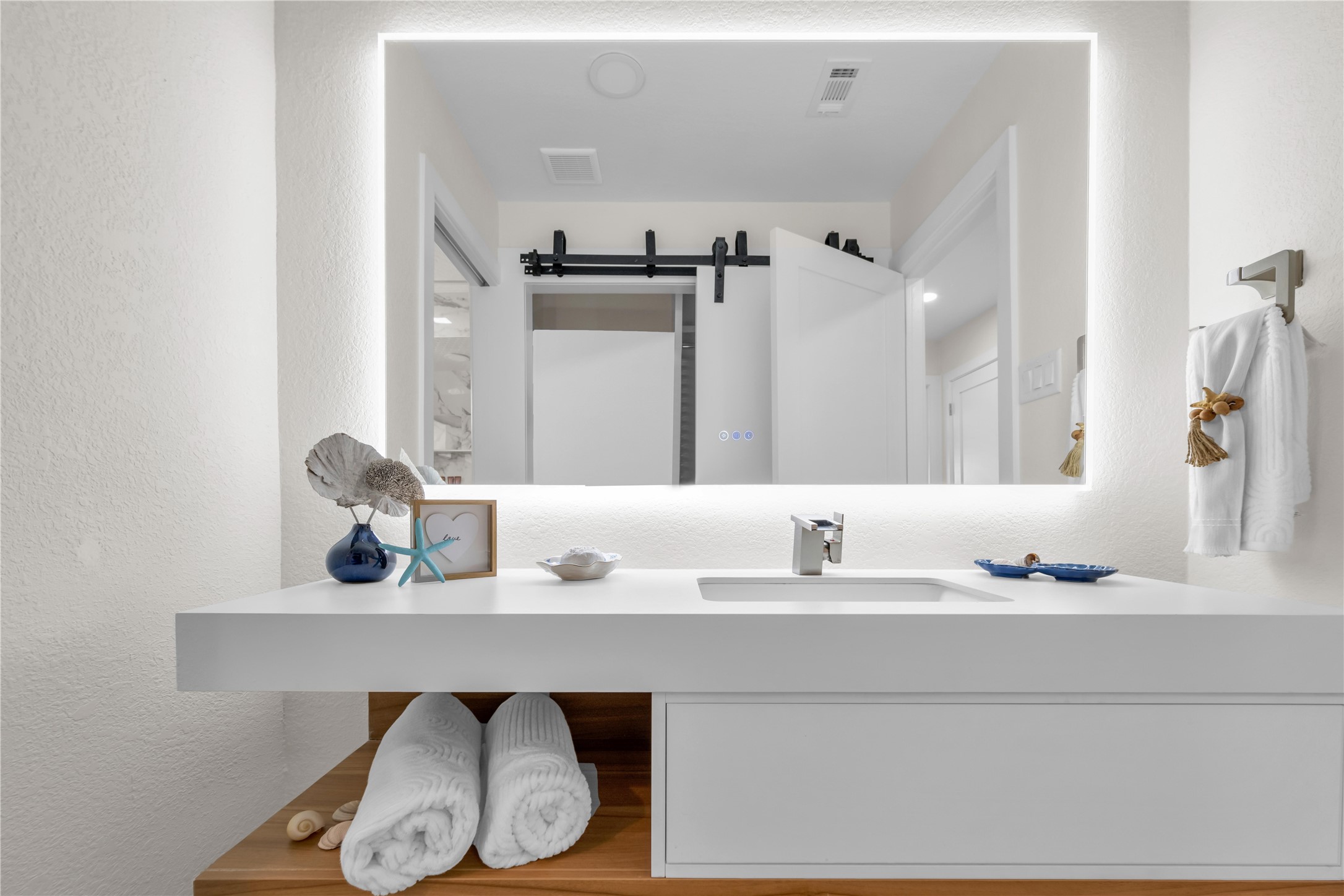 30 Regency Montgomery, TX 77356 - Photo 30 of 47 a bathroom with a sink and a mirror