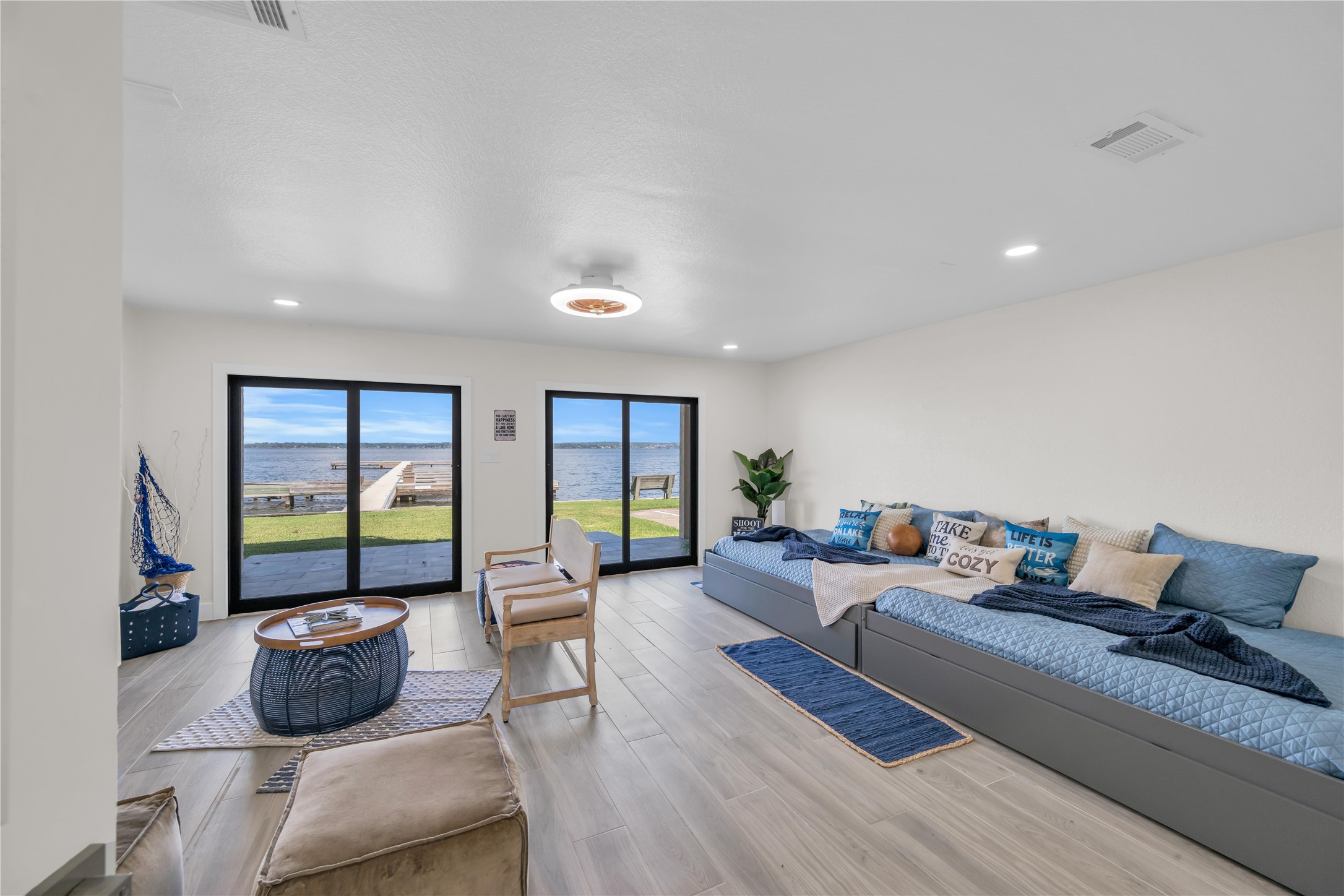 30 Regency Montgomery, TX 77356 - Photo 34 of 47 Oversized living / entertainment quarters on the 1st floor of the home.