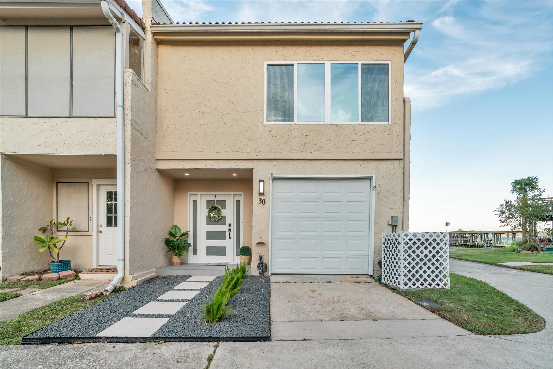 30 Regency Montgomery, TX 77356 - Photo 6 of 47 a front view of a house with garden