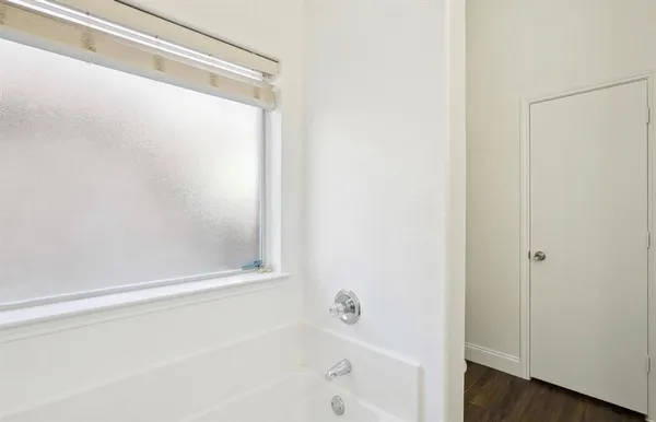 a bathroom with a bathtub