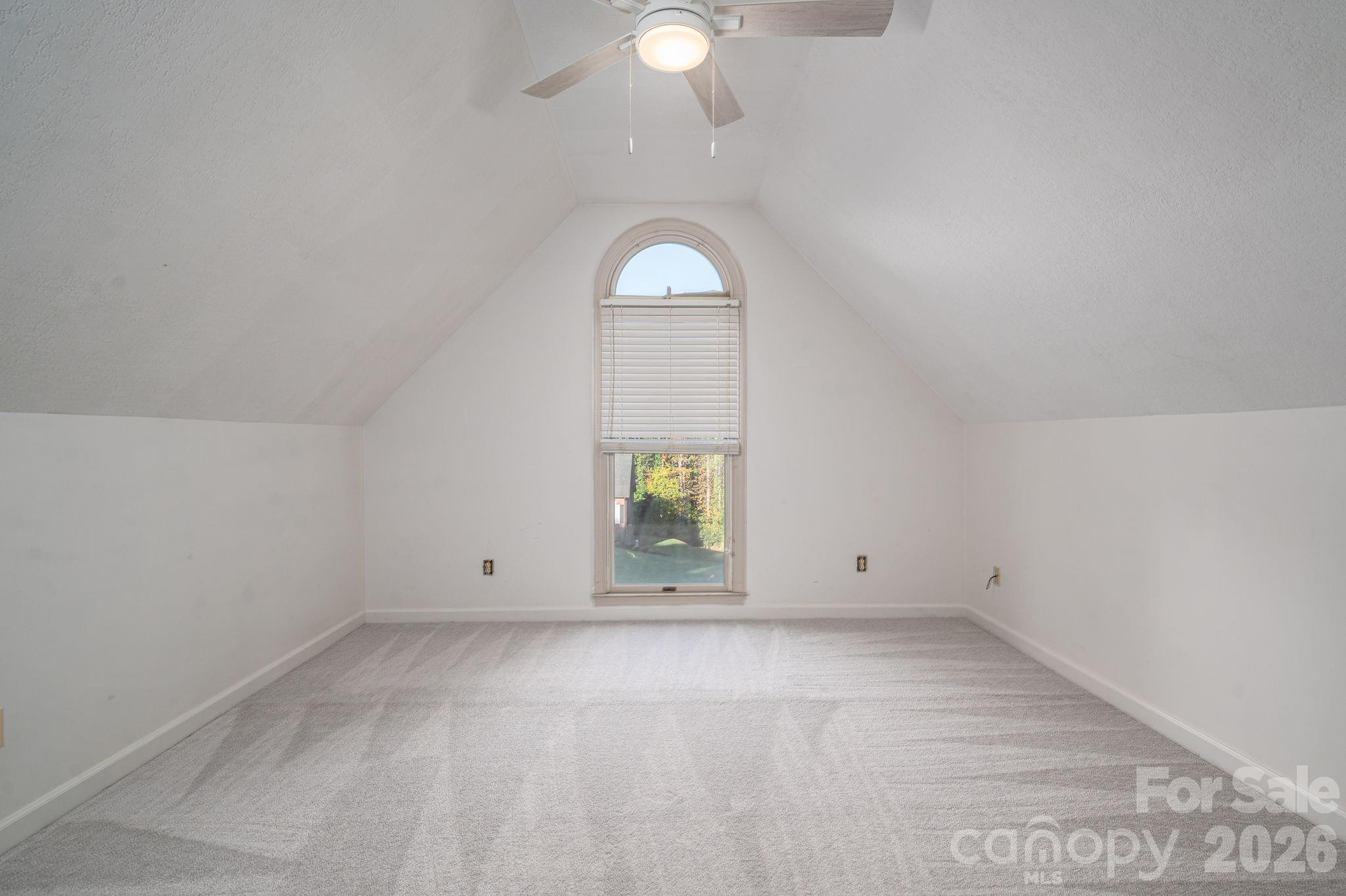 208 Hollow Road Lincolnton, NC 28092 - Photo 32 of 48 an empty room with window hardwood and hardwood floor