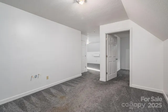 an empty room with a bathroom