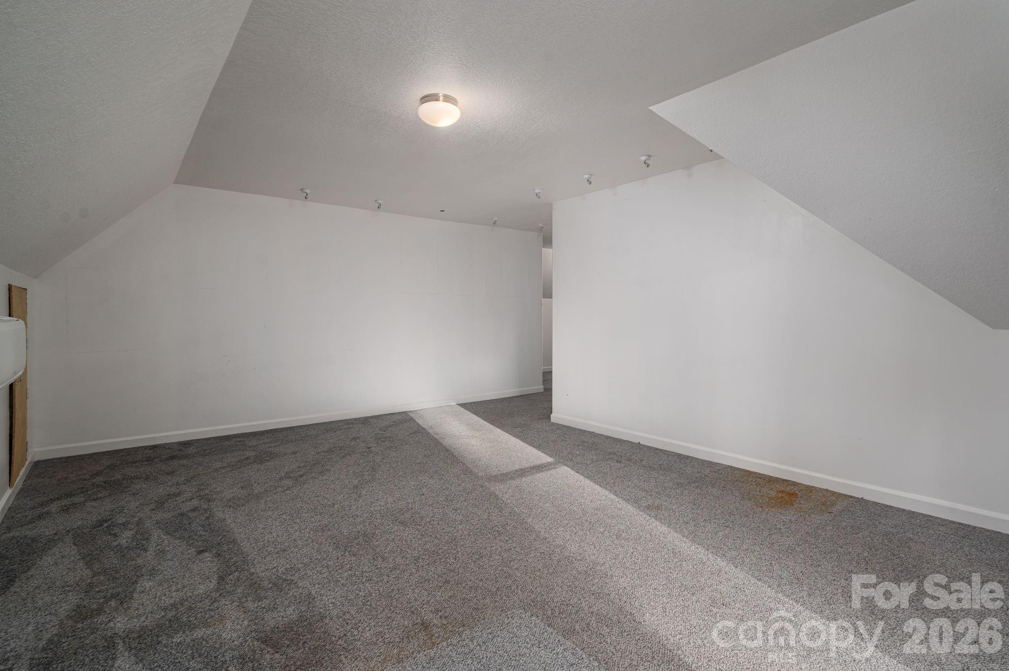 208 Hollow Road Lincolnton, NC 28092 - Photo 39 of 48 an empty room with an entryway