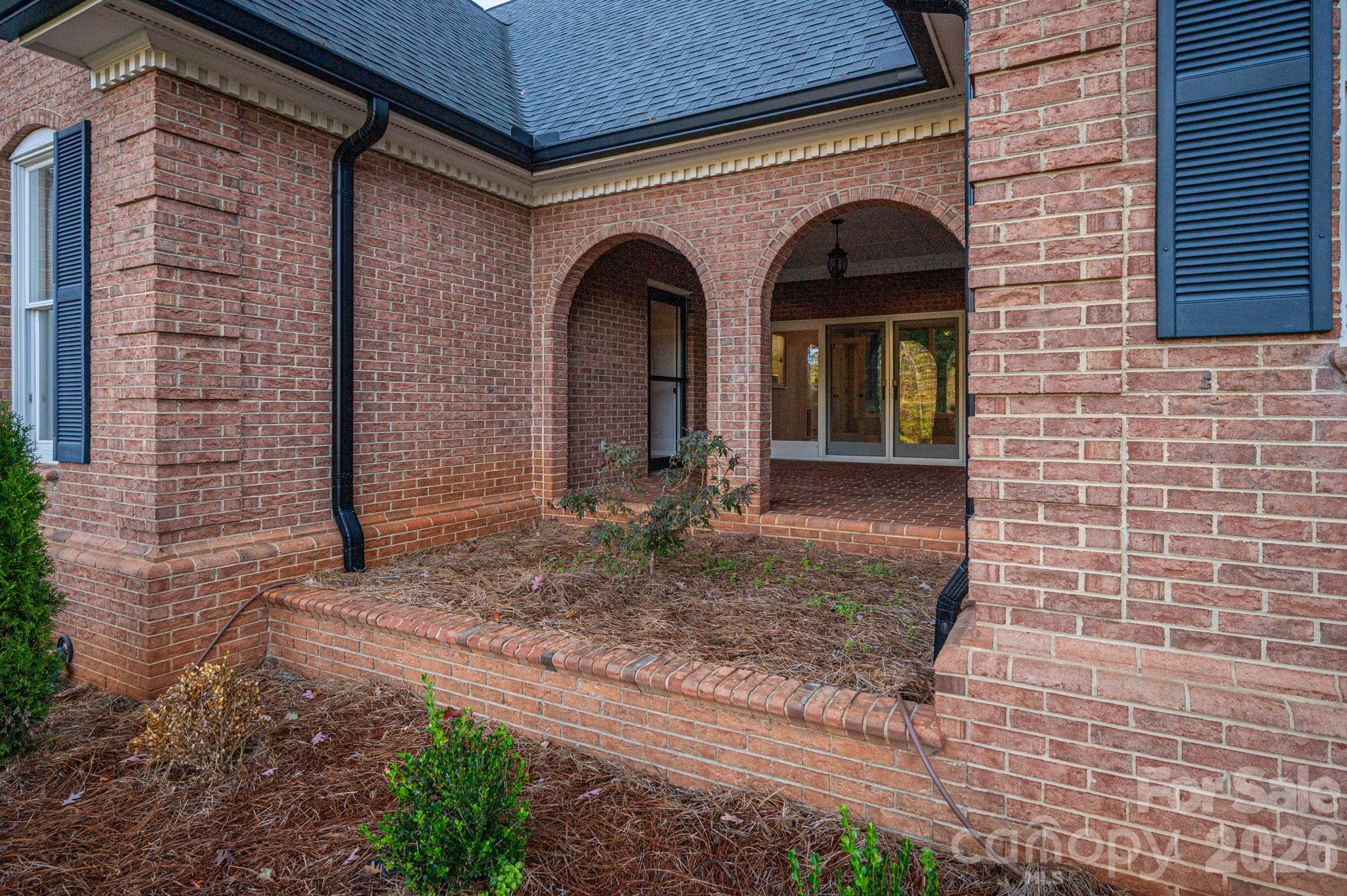 208 Hollow Road Lincolnton, NC 28092 - Photo 6 of 48 a front view of a house with garden