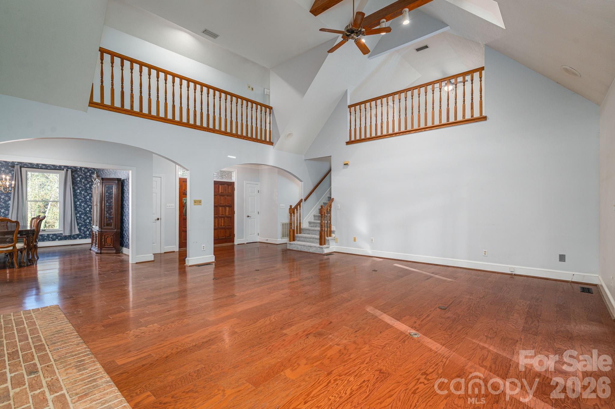 208 Hollow Road Lincolnton, NC 28092 - Photo 8 of 48 a view of an empty room with wooden floor