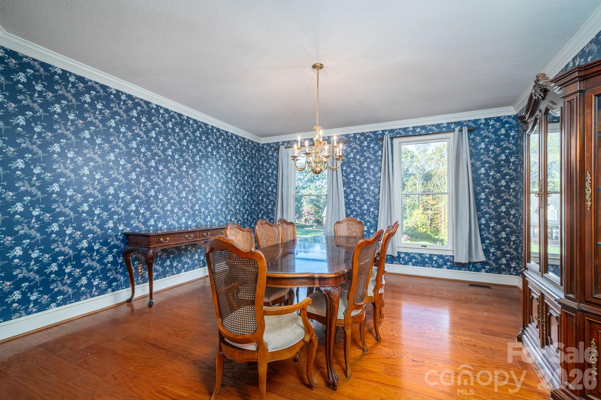 208 Hollow Road Lincolnton, NC 28092 - Photo 10 of 48 a dining room with furniture window and wooden floor