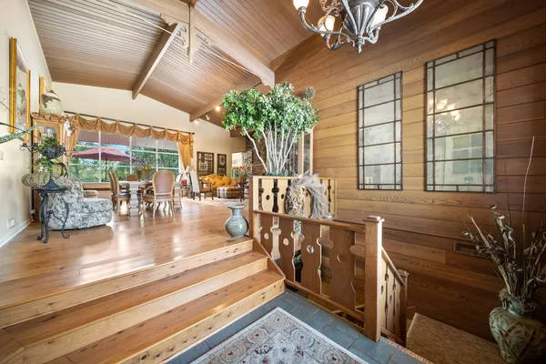 a view of an entryway with a chandelier