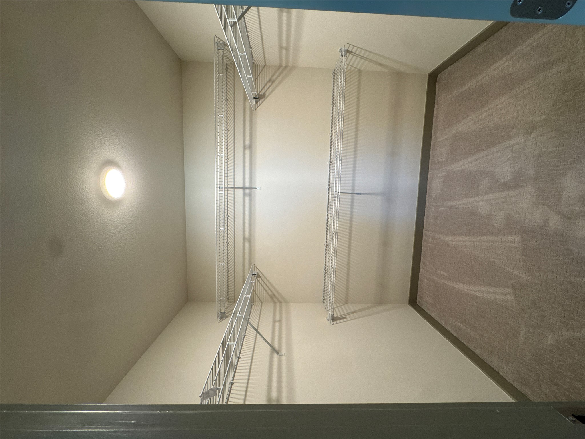 691 Union Chapel Road, Unit B1 Cedar Creek, TX 78612 - Photo 16 of 28 Spacious closet with dark colored carpet