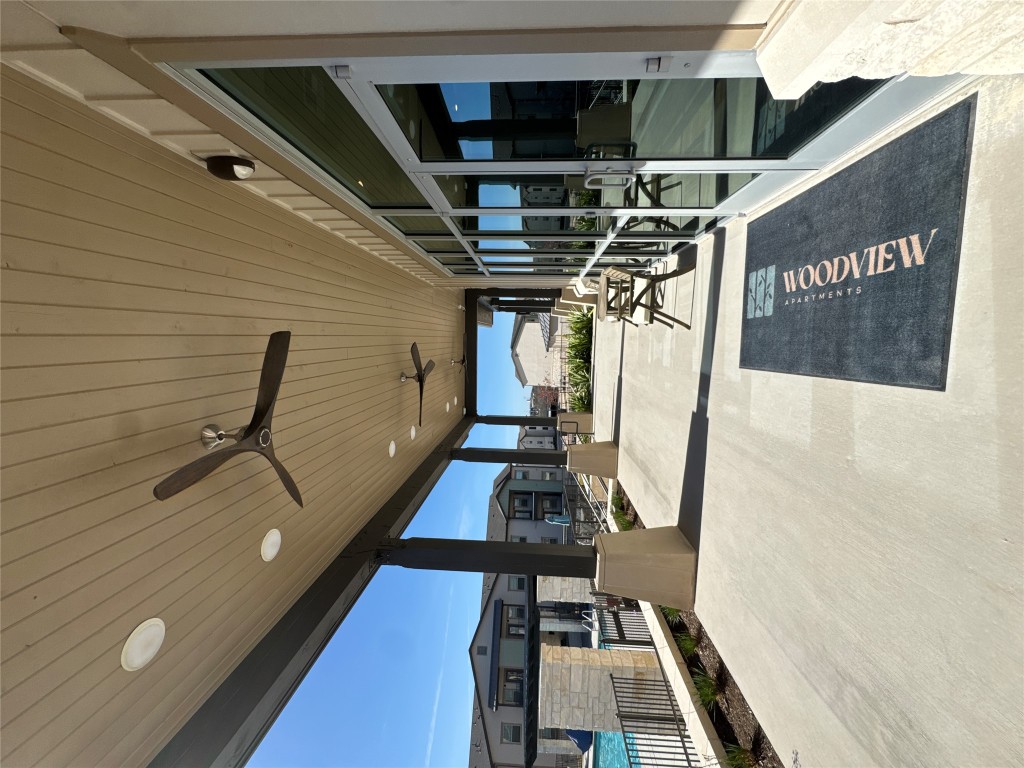 691 Union Chapel Road, Unit B1 Cedar Creek, TX 78612 - Photo 20 of 28 View of patio / terrace featuring a ceiling fan and a residential view