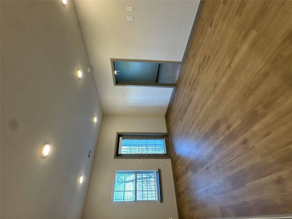 691 Union Chapel Road, Unit B1 Cedar Creek, TX 78612 - Photo 7 of 28 Living room featuring light wood-style floors and recessed lighting