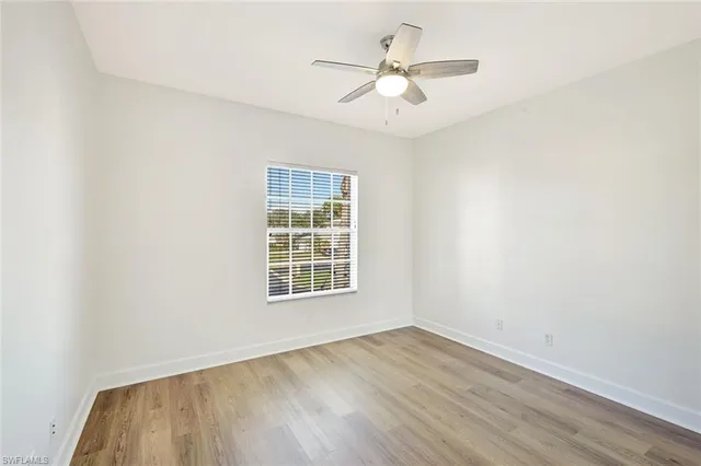 $389,500 | 675 Wiggins Lake Drive, Unit 202, Naples, FL 34110