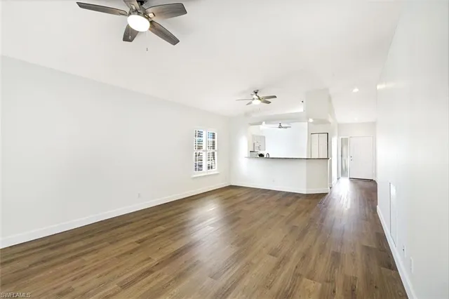 $389,500 | 675 Wiggins Lake Drive, Unit 202, Naples, FL 34110