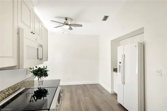 $389,500 | 675 Wiggins Lake Drive, Unit 202, Naples, FL 34110