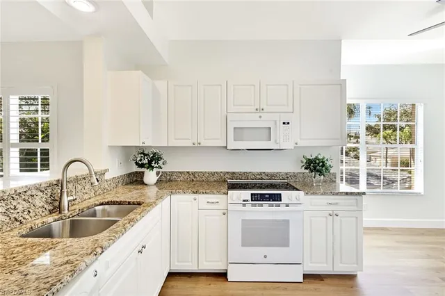$389,500 | 675 Wiggins Lake Drive, Unit 202, Naples, FL 34110