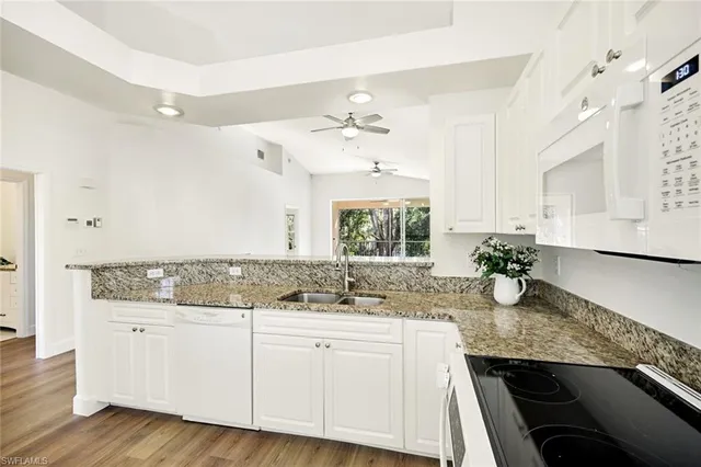 $389,500 | 675 Wiggins Lake Drive, Unit 202, Naples, FL 34110