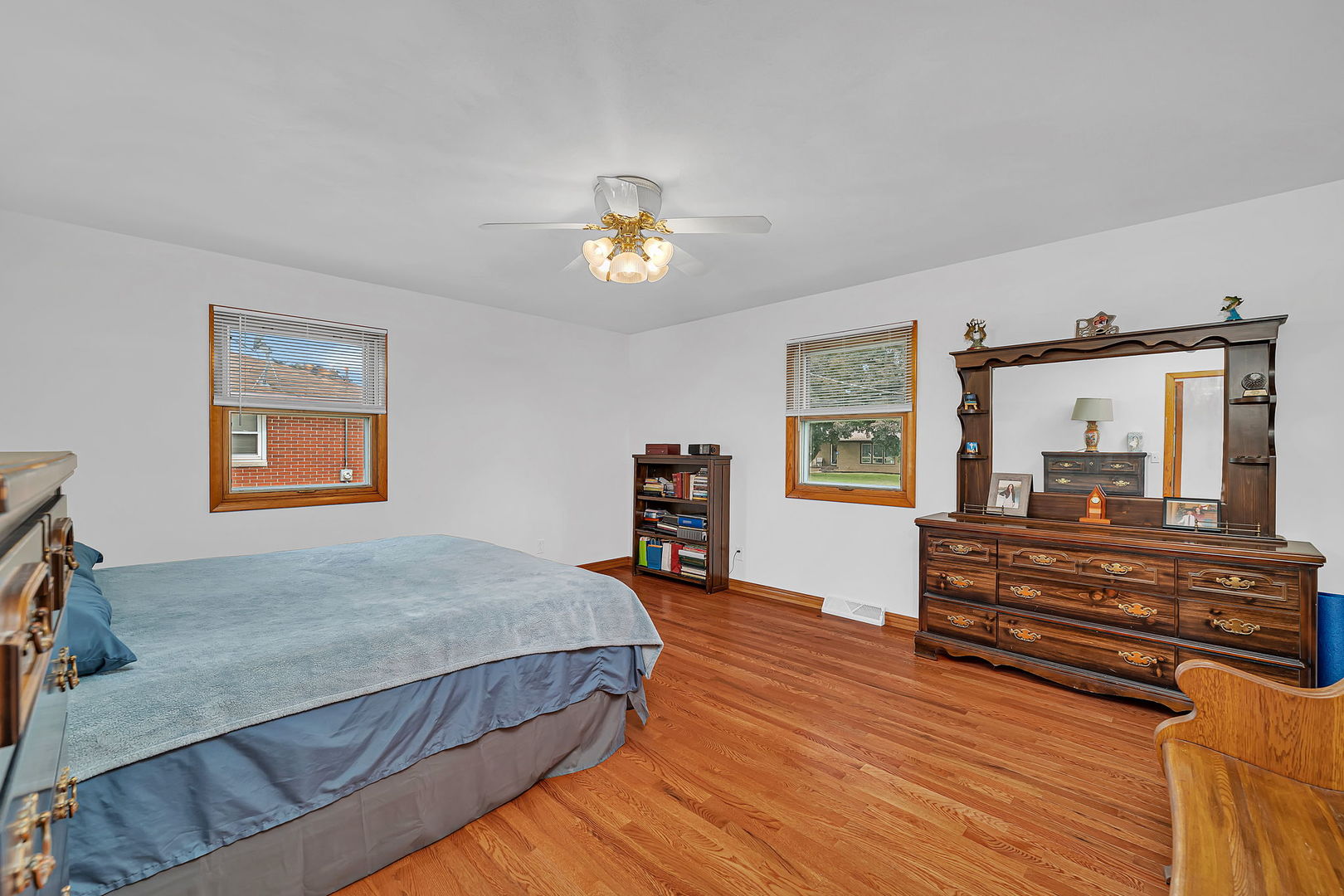 1413 Sharon Road Streator, IL 61364 - Photo 15 of 32 a bedroom with furniture and a mirror