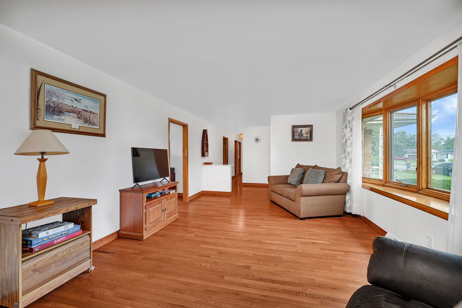 1413 Sharon Road Streator, IL 61364 - Photo 6 of 32 a living room with furniture and a flat screen tv