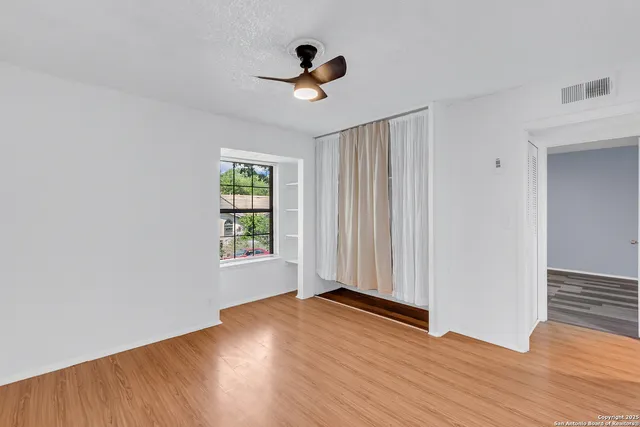 a en suite bathroom with a sink and a mirror