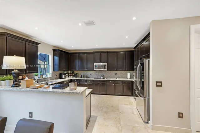 $1,090,000 | 9835 Northwest 86th Terrace, Doral, FL 33178