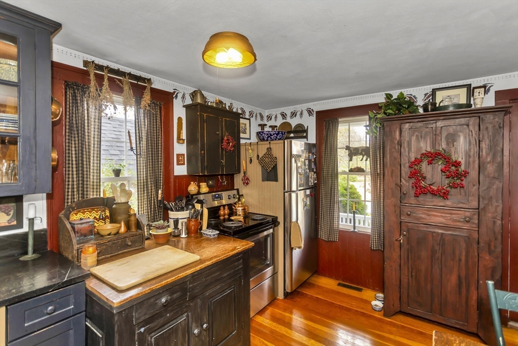 20 Auburn Street Chicopee, MA 01013 - Photo 11 of 36 a view of a kitchen with furniture and window