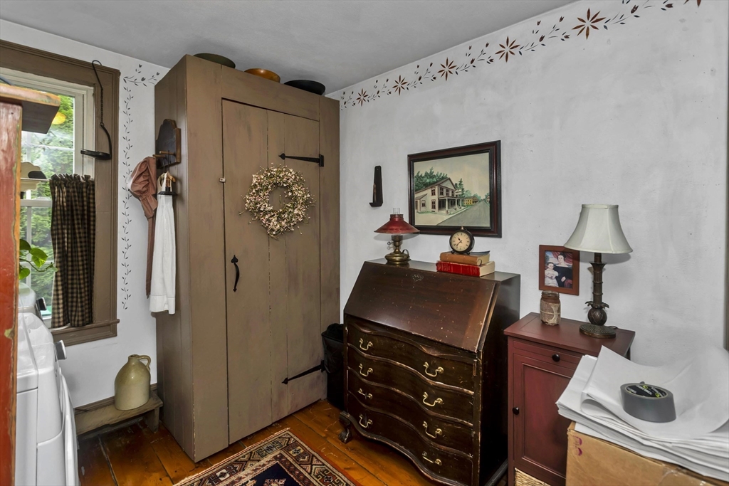 20 Auburn Street Chicopee, MA 01013 - Photo 16 of 36 a bed room with a bed and a television