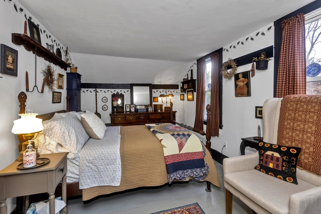 20 Auburn Street Chicopee, MA 01013 - Photo 22 of 36 a bedroom with a bed and wooden floor